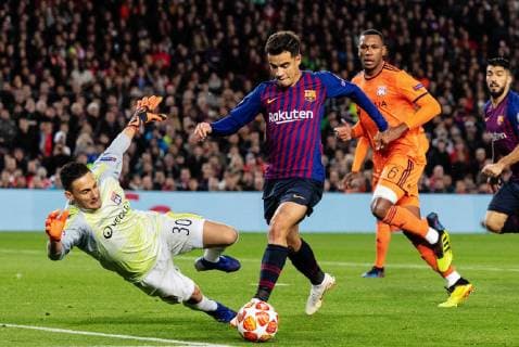 (190314) -- BARCELONA, March 14, 2019 -- Lyon s goalkeeper Mathieu Gorgelin (1st L) vies with Barcelona s Philippe Coutinho (2nd L) during the UEFA Champions League match between Spanish team FC Barcelona Barca and French team Lyon in Barcelona, Spain, on March 13, 2019. Barcelona won 5-1 and advanced to the quarterfinals. ) (SP)SPAIN-BARCELONA-SOCCER-UEFA CHAMPIONS LEAGUE-1 8 FINALS-BARCELONA VS LYON JoanxGosa 