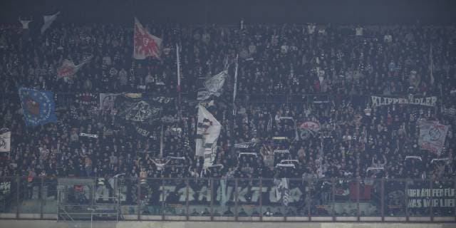14.03.2019, xkvx, Fussball Europa League 1 8 Finale, Inter Mailand - Eintracht Frankfurt emspor, v.l. Eintracht Frankfurt Fans die Pyrotechnik anzuenden waehrend des Spiels (DFL DFB REGULATIONS PROHIBIT ANY USE OF PHOTOGRAPHS as IMAGE SEQUENCES and or QUASI-VIDEO) Mailand