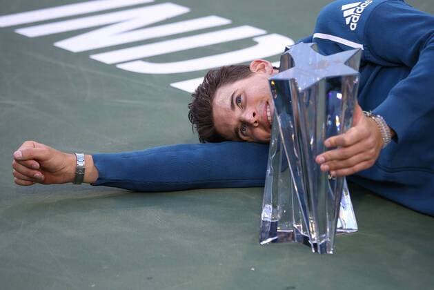 Sport Themen der Woche KW11 Sport Bilder des Tages Dominic Thiem of Austria holds the championship trophy after winning his men s final match against Roger Federer of Switzerland at the BNP Paribas Open in Indian Wells, California on March 17, 2019. Thiem defeated Federer 3-6, 6-3, 7-5 to win the championship and his first ATP Tennis Herren Masters 1000 tournament.  IDW201903177048 DAVIDxSILPA