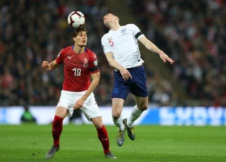 22nd March 2019, Wembley Stadium, London, England; UEFA European Championships Qualification football, England versus Czech Republic; Michael Keane of England heads the ball out over Patrik Schick of Czech Republic  ActionPlus12116786 JohnxPatrickxFletcher