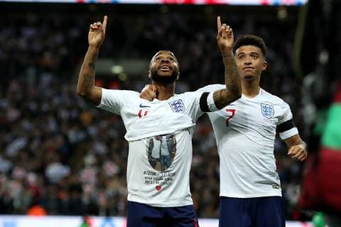 Sport Bilder des Tages 22nd March 2019, Wembley Stadium, London, England; UEFA European Championships Qualification football, England versus Czech Republic; Raheem Sterling of England celebrates as he scores for 3-0 in the 62nd minute by showing a t-shirt in memory of Damary Dawkins  ActionPlus12116865 ShaunxBrooks