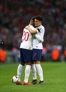 22nd March 2019, Wembley Stadium, London, England; UEFA European Championships Qualification football, England versus Czech Republic; Callum Hudson-Odoi of England and Jadon Sancho of England congratulate each other with a hug after full time  ActionPlus12116926 JohnxPatrickxFletcher