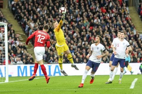 England Goalkeeper Jordan Pickford punches clear ahead of Lukas Masopust of Czech Republic during the UEFA EURO EM Europameisterschaft Fussball Qualifier EM Europameisterschaft Group A match between England and Czech Republic at Wembley Stadium, London, England on 22 March 2019. Copyright: xKenxSparksx 23420044
