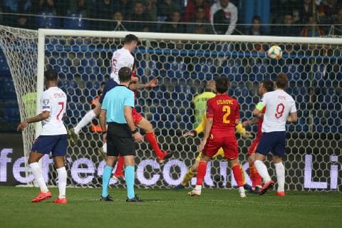 Montenegro v England UEFA EURO EM Europameisterschaft Fussball 2020 Qualifiers Michael Keane of England scores his sides 1st goal during the UEFA Euro 2020 Qualifiers match at the Podgorica City Stadium, Podgorica Content Not Available For UK Newspapers Copyright: xPaulxChestertonx FIL-13030-0048