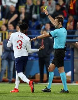 Montenegro v England UEFA EURO EM Europameisterschaft Fussball 2020 Qualifiers Danny Rose of England gets a yellow card from Referee Aleksei Kulbakov during the UEFA Euro 2020 Qualifiers match at the Podgorica City Stadium, Podgorica Content Not Available For UK Newspapers Copyright: xPaulxChestertonx FIL-13030-0124