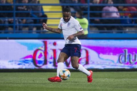 25th March 2019, Podgorica City Stadium, Podgorica, Montenegro; UEFA European Championships Qualification football, Montenegro versus England; Raheem Sterling of England assists Harry Kane of England  ActionPlus12117773 NikolaxKrstic