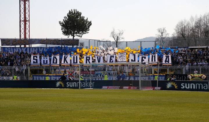 GER, 3.Liga, FC Carl Zeiss Jena vs KFC Uerdingen 05 23.03.19 , Jena, Ernst-Abbe-Sportfeld, GER, 3.Liga, Saison 2018 2019, 30.Spieltag, FC Carl Zeiss Jena vs KFC Uerdingen 05 im Bild Fans Jena Choreografie Südkurve Jena DFL regulations prohibit any use of photographs as image sequences and or quasi-video