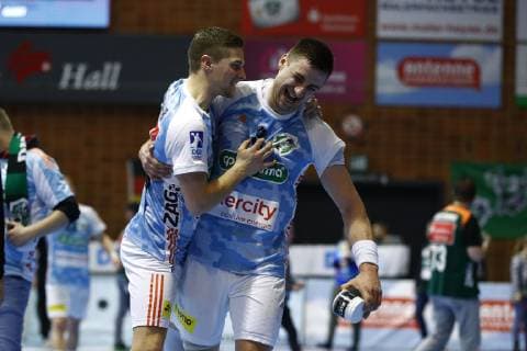 27.03.2019, Swiss Life Hall, Hannover, EHF-Pokal, Gruppenphase, TSV Hannover-Burgdorf vs RK Nexe (HRV), im Bild Vincent Buechner (74, Han.-Burgdorf) und Nejc Cehte (3, Han.-Burgdorf) jubeln nach dem Sieg TSV Hannover-Burgdorf vs RK Nexe