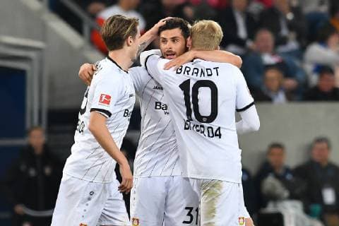 GER, 1. FBL, TSG 1899 Hoffenheim vs. Bayer 04 Leverkusen 29.03.2019, PreZero Dual Arena, Sinsheim, GER, 1. FBL, TSG 1899 Hoffenheim vs. Bayer 04 Leverkusen, DFL REGULATIONS PROHIBIT ANY USE OF PHOTOGRAPHS AS IMAGE SEQUENCES AND OR QUASI-VIDEO. im Bild: Kevin Volland (Bayer 04 Leverkusen 31) jubelt mit Tin Jedvaj ( 16, Bayer 04 Leverkusen) und Julian Brandt ( 10, Bayer 04 Leverkusen) ueber sein Tor zum 1:1 *** GER 1 FBL TSG 1899 Hoffenheim vs Bayer 04 Leverkusen 29 03 2019 PreZero Dual Arena Sinsheim GER 1 FBL TSG 1899 Hoffenheim vs Bayer 04 Leverkusen DFL REGULATIONS PROHIBIT ANY USE OF PHOTOGRAPHS AS IMAGE SEQUENCES AND OR QUASI VIDEO in picture Kevin Volland Bayer 04 Leverkusen 31 cheers with Tin Jedvaj 16 Bayer 04 Leverkusen and Julian Brandt 10 Bayer 04 Leverkusen over his goal to 1 1 nordphotox xFabisch nordphoto00100