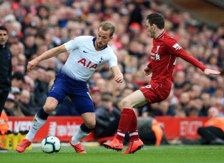 31st March 2019, Anfield, Liverpool, England; EPL Premier League football, Liverpool versus Tottenham Hotspur; Harry Kane of Tottenham Hotspur is tackled by Andrew Robertson of Liverpool  ActionPlus12118917 DavidxBlunsden