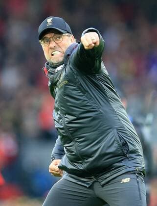 Sport Bilder des Tages 31st March 2019, Anfield, Liverpool, England; EPL Premier League football, Liverpool versus Tottenham Hotspur; Liverpool manager Jurgen Klopp celebrates with a flurry of punches in front of the Kop after Liverpool win 2-1  ActionPlus12118971 DavidxBlunsden
