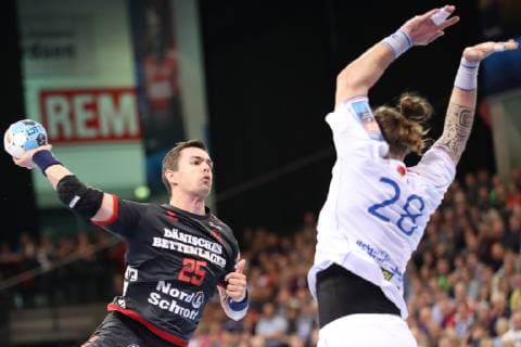 SG Flensburg-Handewitt vs Brest HC Meshkov, Handball, EHF Champions League Achtelfinale, 31.03.19 Rasmus Lauge Schmidt (SG Flensburg-Handewitt, 25) gegen Pavel Horak (Brest HC Meshkov, 28)