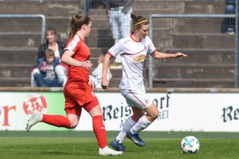 v. li.: Anna Julia Grassinger (SGS Essen II, 15), Carolin Schraa (FC Köln, 7), Zweikampf, Duell, duel, tackle, tackling, Dynamik, Action, Aktion, Fussball, 2. Frauen-Bundesliga, 1. FC Köln - SGS Essen II, DFB REGULATIONS PROHIBIT ANY USE OF PHOTOGRAPHS AS IMAGE SEQUENCES AND OR QUASI-VIDEO.