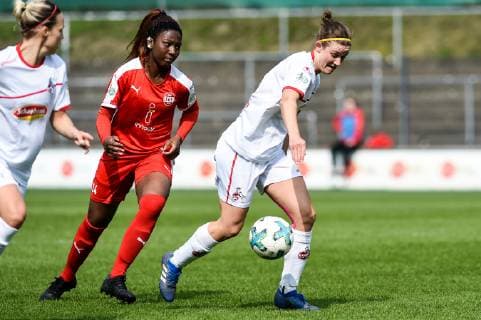 v. li.: Barakissa Coulibaly (SGS Essen II, 24), Carolin Schraa (FC Köln, 7), Zweikampf, Duell, duel, tackle, tackling, Dynamik, Action, Aktion, Fussball, 2. Frauen-Bundesliga, 1. FC Köln - SGS Essen II, DFB REGULATIONS PROHIBIT ANY USE OF PHOTOGRAPHS AS IMAGE SEQUENCES AND OR QUASI-VIDEO.