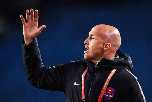 Head coach Jordi Cruyff of Chongqing SWM reacts as he watches his players competing against Shenzhen F.C. in their 3rd round match during the 2019 Chinese Football Association Super League (CSL) in Chongqing, China, 31 March 2019. Chongqing SWM defeated Shenzhen F.C. 1-0.