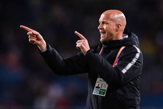 Head coach Jordi Cruyff of Chongqing SWM reacts as he watches his players competing against Shenzhen F.C. in their 3rd round match during the 2019 Chinese Football Association Super League (CSL) in Chongqing, China, 31 March 2019. Chongqing SWM defeated Shenzhen F.C. 1-0.