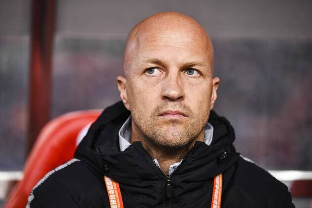 Head coach Jordi Cruyff of Chongqing SWM reacts as he watches his players competing against Shenzhen F.C. in their 3rd round match during the 2019 Chinese Football Association Super League (CSL) in Chongqing, China, 31 March 2019. Chongqing SWM defeated Shenzhen F.C. 1-0.