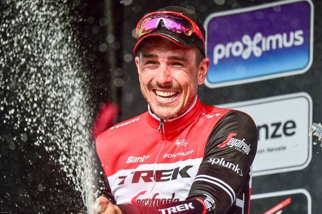 Podium v.l.n.r. (2.) John Degenkolb (GER Trek-Segafredo) - (1.) Alexander Kristoff (NOR UAE-Team Emirates) - (3.) Oliver Naesen (BEL AG2R-La Mondiale) - hier mit Sektdusche Champagnerdusche untereinander - Podium - Siegerehrung - Ehrung - Auszeichnung - Zeremonie - Zelebrierung - Ceremony - Jubel - Freude - Luck - Emotion - Emotionen - Mimik - Mimic - Gestik - Gestic - Querformat - quer - horizontal - Event Veranstaltung: 81. Gent-Wevelgem In Flanders Fields - Deinze nach to Wevelgem 249.5 km - Ort Location: Wevelgem - Region: Flandern Vlaanderen - Land Country: Belgien Belgium - Datum Date: 31.03.2019 Cycling Radsport 81. Gent-Wevelgem In Flanders Fields 31.03.2019