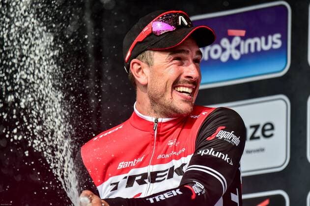 Podium v.l.n.r. (2.) John Degenkolb (GER Trek-Segafredo) - (1.) Alexander Kristoff (NOR UAE-Team Emirates) - (3.) Oliver Naesen (BEL AG2R-La Mondiale) - hier mit Sektdusche Champagnerdusche untereinander - Podium - Siegerehrung - Ehrung - Auszeichnung - Zeremonie - Zelebrierung - Ceremony - Jubel - Freude - Luck - Emotion - Emotionen - Mimik - Mimic - Gestik - Gestic - Querformat - quer - horizontal - Event Veranstaltung: 81. Gent-Wevelgem In Flanders Fields - Deinze nach to Wevelgem 249.5 km - Ort Location: Wevelgem - Region: Flandern Vlaanderen - Land Country: Belgien Belgium - Datum Date: 31.03.2019 Cycling Radsport 81. Gent-Wevelgem In Flanders Fields 31.03.2019