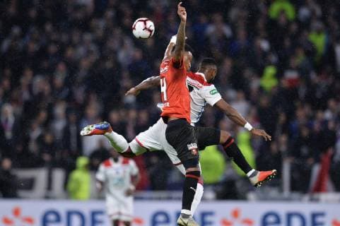 Moussa Dembele (lyon) vs Edson Sitoe (rennes) FOOTBALL : Lyon vs Rennes - 1 2 finale de Coupe de France - 02 04 2019 FredericChambert Panoramic 