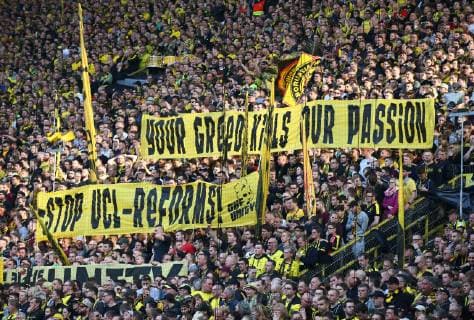 Samstag 30.03.2019, Saison 2018 2019, 1. Bundesliga, 27. Spieltag im Dortmunder Signal Iduna Park, BVB 09 Borussia Dortmund - VfL Wolfsburg, Die Dortmunder Fans unterstützen ihr Team auf der Südtribüne Spruchband von The Unity zum Thema Champions League Reform: Your Greed kills our Passion - Stop UCL-Reforms DFL REGULATIONS PROHIBIT ANY USE OF PHOTOGRAPHS AS IMAGE SEQUENCES AND OR QUASI-VIDEO.