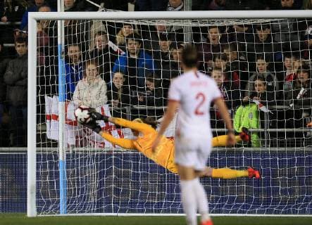 5th April 2019, Academy Stadium, Manchester, England; Womens International football friendly, England versus Canada; Stephanie Labbe of Canada dives to save a shot at goal from Steph Houghton of England  ActionPlus12121019 DavidxBlunsden