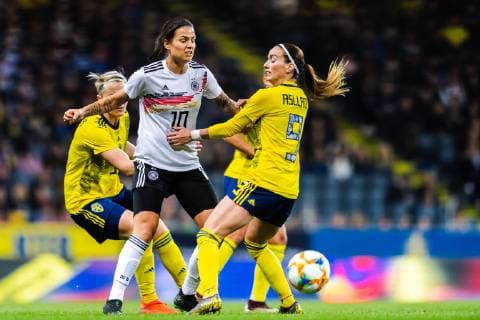 190406 Dzsenifer Marozsan of Germany and Kosovare Asllani of Sweden during the women s International Friendly Länderspiel football match between Sweden and Germany on April 6, 2019 in Stockholm. Photo: Joel Marklund BILDBYRAN kod JM 87921 Copyright: JOELxMARKLUND BB190406JM018