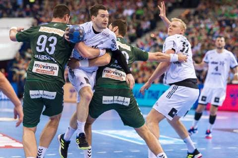 Hamburg, Deutschland 06. April 2019: REWE Final 4 - DHB Pokal Halbfinale - THW Kiel vs. Fuechse Berlin v.li. Mijajlo Marsenic (Berlin), Miha Zarabec (THW Kiel), Jakov Gojun (Berlin), Patrick Wiencek (THW Kiel) Hamburg Barclaycard Arena Hamburg Deutschland