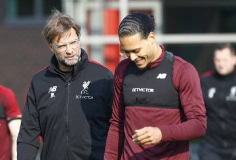 8th April 2019, Melwood, Liverpool, England; Liverpool training session ahead of their Champions League fixture against FC Porto; Manager Jurgen Klopp and Virgil van Dijk during Liverpool s open training session at Melwood ahead of tomorrow night s Champions League quarter final first leg versus FC Porto  ActionPlus12122186 AlanxMartin