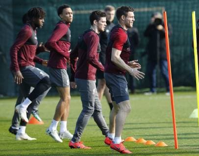 8th April 2019, Melwood, Liverpool, England; Liverpool training session ahead of their Champions League fixture against FC Porto; James Milner, Andy Robertson and Trent Alexander-Arnold during Liverpool s open training session at Melwood ahead of tomorrow night s Champions League quarter final first leg versus FC Porto  ActionPlus12122198 AlanxMartin