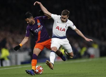 Riyad Marhez of Manchester City tackled by Harry Winks of Tottenham during the UEFA Champions League match at the Tottenham Hotspur Stadium, London. Picture date: 9th April 2019. Picture credit should read: Darren Staples Sportimage EDITORIAL USE ONLY. No use with unauthorised audio, video, data, fixture lists, club league logos or live services. Online in-match use limited to 120 images, no video emulation. No use in betting, games or single club league player publications. SPI-0025-0031