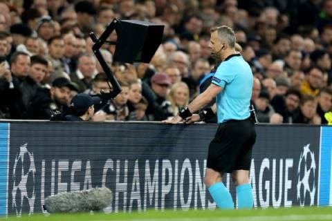 9th April 2019, Tottenham Hotspur Stadium, London, England; UEFA Champions League football, quarter final 1st leg, Tottenham Hotspur versus Manchester City; The referee reviews the penalty appeal via VAR  ActionPlus12122380 ShaunxBrooks