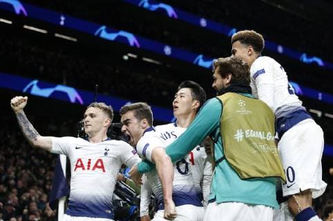 (190410) -- LONDON, April 10, 2019 (Xinhua) -- Tottenham Hotspur s Heung-Min Son (C) celebrates scoring the winning goal with teammates during the UEFA Champions League Quater Final First Leg match between Tottenham Hotspur and Manchester City at The Tottenham Hotspur Stadium in London, Britain on April 9, 2019. Tottenham Hotspur won 1-0. (Xinhua Matthew Impey) FOR EDITORIAL USE ONLY. NOT FOR SALE FOR MARKETING OR ADVERTISING CAMPAIGNS. NO USE WITH UNAUTHORIZED AUDIO, VIDEO, DATA, FIXTURE LISTS, CLUB LEAGUE LOGOS OR LIVE SERVICES. ONLINE IN-MATCH USE LIMITED TO 45 IMAGES, NO VIDEO EMULATION. NO USE IN BETTING, GAMES OR SINGLE CLUB LEAGUE PLAYER PUBLICATIONS. (SP)BRITAIN-LONDON-FOOTBALL-CHAMPIONS LEAGUE-QUARTERFINAL-TOT HOTSPUR VS MAN CITY 