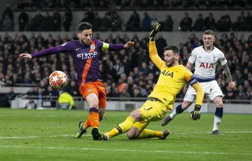 (190410) -- LONDON, April 10, 2019 (Xinhua) -- Tottenham Hotspur s goalkeeper Hugo Lloris (C) vies with Manchester City s David Silva (L) during the UEFA Champions League Quater Final First Leg match between Tottenham Hotspur and Manchester City at The Tottenham Hotspur Stadium in London, Britain on April 9, 2019. Tottenham Hotspur won 1-0. (Xinhua Han Yan) FOR EDITORIAL USE ONLY. NOT FOR SALE FOR MARKETING OR ADVERTISING CAMPAIGNS. NO USE WITH UNAUTHORIZED AUDIO, VIDEO, DATA, FIXTURE LISTS, CLUB LEAGUE LOGOS OR LIVE SERVICES. ONLINE IN-MATCH USE LIMITED TO 45 IMAGES, NO VIDEO EMULATION. NO USE IN BETTING, GAMES OR SINGLE CLUB LEAGUE PLAYER PUBLICATIONS. (SP)BRITAIN-LONDON-FOOTBALL-CHAMPIONS LEAGUE-QUARTERFINAL-TOT HOTSPUR VS MAN CITY 