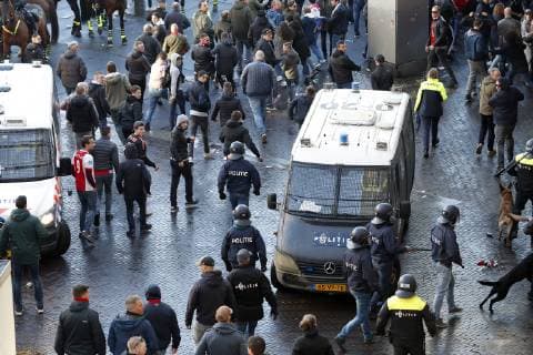 police with Ajax fans during the UEFA Champions League quarter final match Ajax Amsterdam and Juventus FC at the Johan Cruijff Arena on April 10, 2019 in Amsterdam, The Netherlands UEFA Champions League 2018 2019 xVIxVIxImagesx xMauricexvanxSteenxIVx 14158638