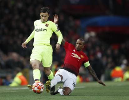 Philippe Coutinho of Barcelona tackled by Ashley Young of Manchester United ManU during the UEFA Champions League match at Old Trafford, Manchester. Picture date: 10th April 2019. Picture credit should read: Darren Staples Sportimage EDITORIAL USE ONLY. No use with unauthorised audio, video, data, fixture lists, club league logos or live services. Online in-match use limited to 120 images, no video emulation. No use in betting, games or single club league player publications. SPI-0026-0018