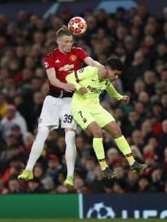 Scott McTominay of Manchester United ManU challenges Philippe Coutinho of Barcelona during the UEFA Champions League match at Old Trafford, Manchester. Picture date: 10th April 2019. Picture credit should read: Darren Staples Sportimage EDITORIAL USE ONLY. No use with unauthorised audio, video, data, fixture lists, club league logos or live services. Online in-match use limited to 120 images, no video emulation. No use in betting, games or single club league player publications. SPI-0026-0034