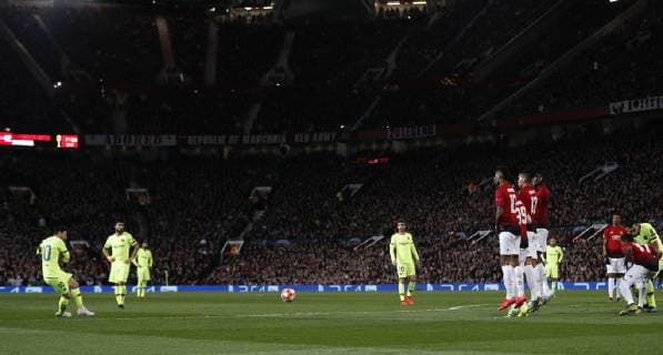 Lionel Messi of Barcelona hits free kick under the wall during the UEFA Champions League match at Old Trafford, Manchester. Picture date: 10th April 2019. Picture credit should read: Darren Staples Sportimage EDITORIAL USE ONLY. No use with unauthorised audio, video, data, fixture lists, club league logos or live services. Online in-match use limited to 120 images, no video emulation. No use in betting, games or single club league player publications. SPI-0026-0045