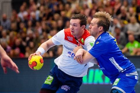 190411 Sander Sagosen of Norway and Max Darj of Sweden during the EHF EURO Cup match between Norway and Sweden on April 11, 2019 in Arendal. Photo: Fredrik Varfjell BILDBYRAN kod FV 150228 Copyright: FREDRIKxVARFJELL BB190411FV010