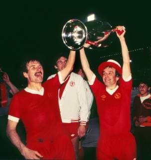 Tommy Smith, Ian Callaghan and Phil Neal (Liverpool) parade the European Cup. Liverpool v Borussia Monchengladbach. European Cup Final. Rome 25 05 1977. 
