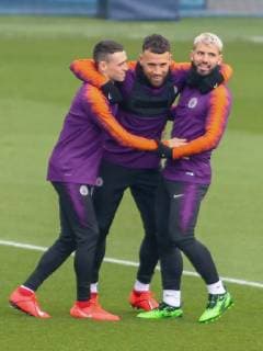 Manchester City Training Phil Foden (left) and Sergio Aguero (right) messagings round with Bernardo Silva during Manchester City training at the Etihad Campus, Manchester Content Not Available For UK Newspapers Copyright: xStevexMcCormickx FIL-13122-0006