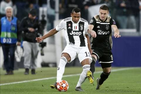 TORINO, Football,16-04-2019, Allianz Stadium . Champions League quarter finals second leg Juventus - Ajax. Juventus player Alex Sandro (L) and Ajax player Dusan Tadic (R) during the game Juventus - Ajax . Juventus - Ajax  x3199553x