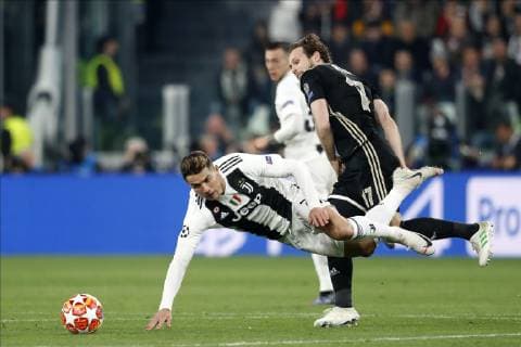 TORINO, Football,16-04-2019, Allianz Stadium . Champions League quarter finals second leg Juventus - Ajax. Juventus player Cristiano Ronaldo (L) and Ajax player Daley Blind (R) during the game Juventus - Ajax . Juventus - Ajax  x3200021x