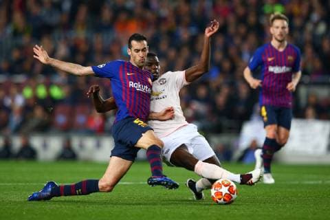 Sergio Busquets of FC Barcelona Barca battles for possession with Paul Pogba of Manchester United ManU during the UEFA Champions League match at Camp Nou, Barcelona. Picture date: 16th April 2019. Picture credit should read: Craig Mercer Sportimage EDITORIAL USE ONLY. No use with unauthorised audio, video, data, fixture lists, club league logos or live services. Online in-match use limited to 120 images, no video emulation. No use in betting, games or single club league player publications. SPI-0042-0052