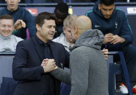 Mauricio Pochettino manager of Tottenham greets Josep Guardiola manager of Manchester City during the UEFA Champions League match at the Etihad Stadium, Manchester. Picture date: 17th April 2019. Picture credit should read: Darren Staples Sportimage EDITORIAL USE ONLY. No use with unauthorised audio, video, data, fixture lists, club league logos or live services. Online in-match use limited to 120 images, no video emulation. No use in betting, games or single club league player publications. SPI-0043-0008