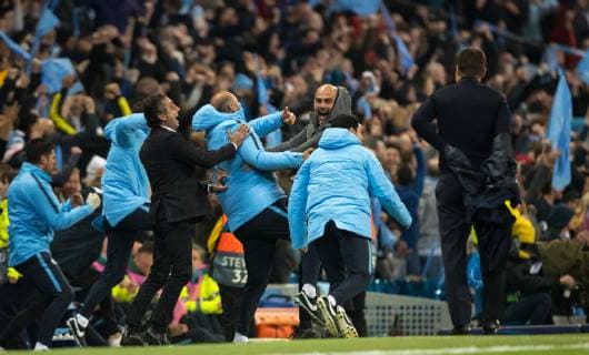 Man City Manager Pep Guardiola celebrates with his staff as he thinks the team have won late in the game only for the goal to be ruled out with VAR during the UEFA Champions League QF 2nd leg match between Manchester City and Tottenham Hotspur at the Etihad Stadium, Manchester, England on 17 April 2019. Copyright: xAndyxRowlandx PMI-2761-0022