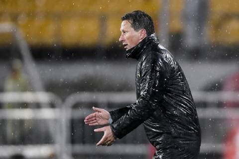 Head coach Roger Schmidt of China s Beijing Sinobo Guoan reacts as he watches his players competing against Thailand s Buriram United in their group G match during the 2019 AFC Champions League in Beijing, China, 24 April 2019. Beijing Sinobo Guoan defeated Buriram United 2-0. *** Local Caption *** Beijing Sinobo Guoan crushes Buriram United at 2019 AFC group G match  scr186220