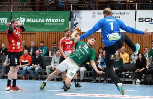 v.li.: Bennet Johen (HC Rhein Vikings), Niklas Weis (HC Rhein Vikings), Michael Schulz (DJK Rimpar Wölfe), Mikkel Moldrup (HC Rhein Vikings), DKB 2. Handball-Bundesliga, DJK Rimpar Wölfe - HC Rhein Vikings