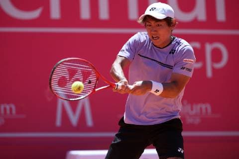 April 29, 2019 - Estoril, Portugal - Yoshihito Nishioka of Japan returns a ball to Mackenzie McDonald of USA during the Millennium Estoril Open - Day 1 - ATP Tennis Herren 250 tennis tournament at the Clube de Tenis do Estoril in Estoril, Portugal on April 29, 2019. Estoril Open 2019 - Day 1  - ZUMAn230 20190429_zaa_n230_172 Copyright: xPedroxFiuzax