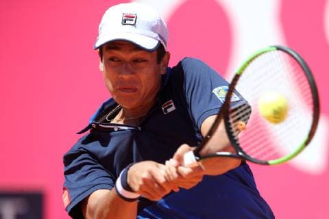 April 29, 2019 - Estoril, Portugal - MACKENZIE MCDONALD of THE USA returns a ball to Yoshihito Nishioka of Japan during the Millennium Estoril Open - Day 1 - ATP Tennis Herren 250 tennis tournament at the Clube de Tenis do Estoril in Estoril, Portugal. Nishioka won 6:2, 6:4. Tennis 2019: Estoril Open: Day 1  - ZUMAn230 20190429_zaa_n230_174 Copyright: xPedroxFiuzax